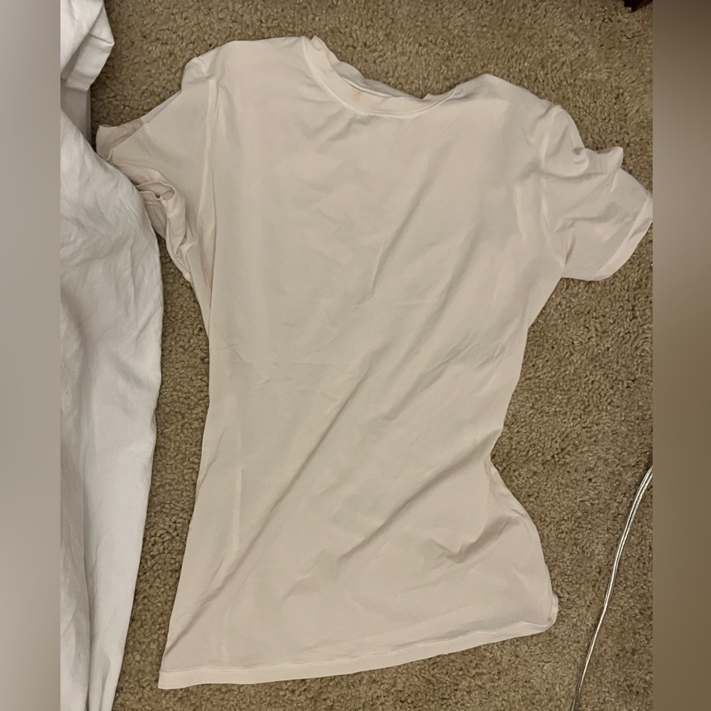 A very tight fitting skins top that makes your body look amazing